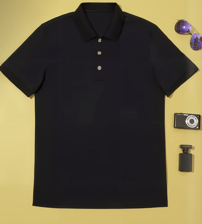Navy polo shirt with a camera, sunglasses, and perfume bottle on a yellow background