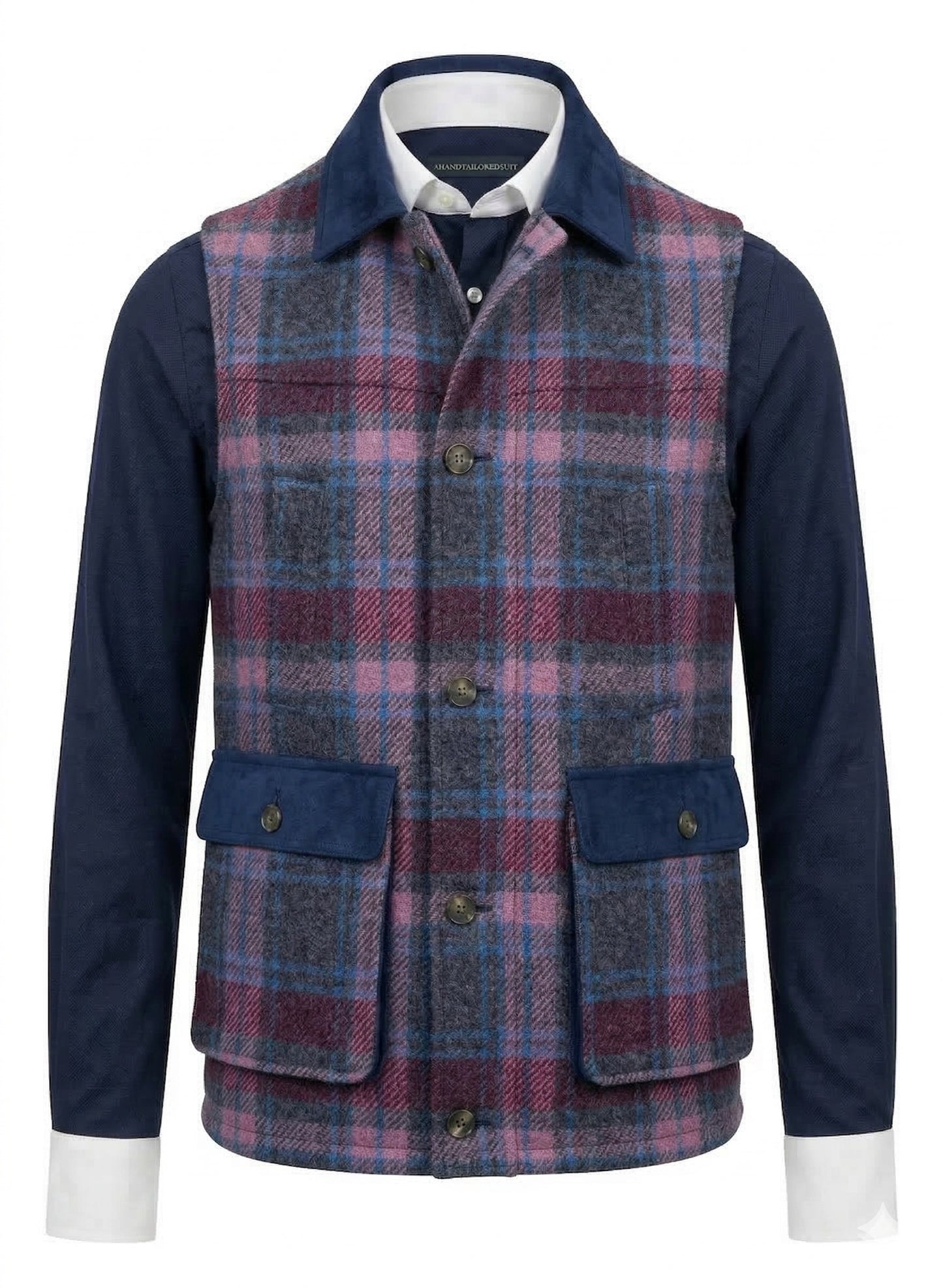 Plaid vest over a navy shirt on a white background
