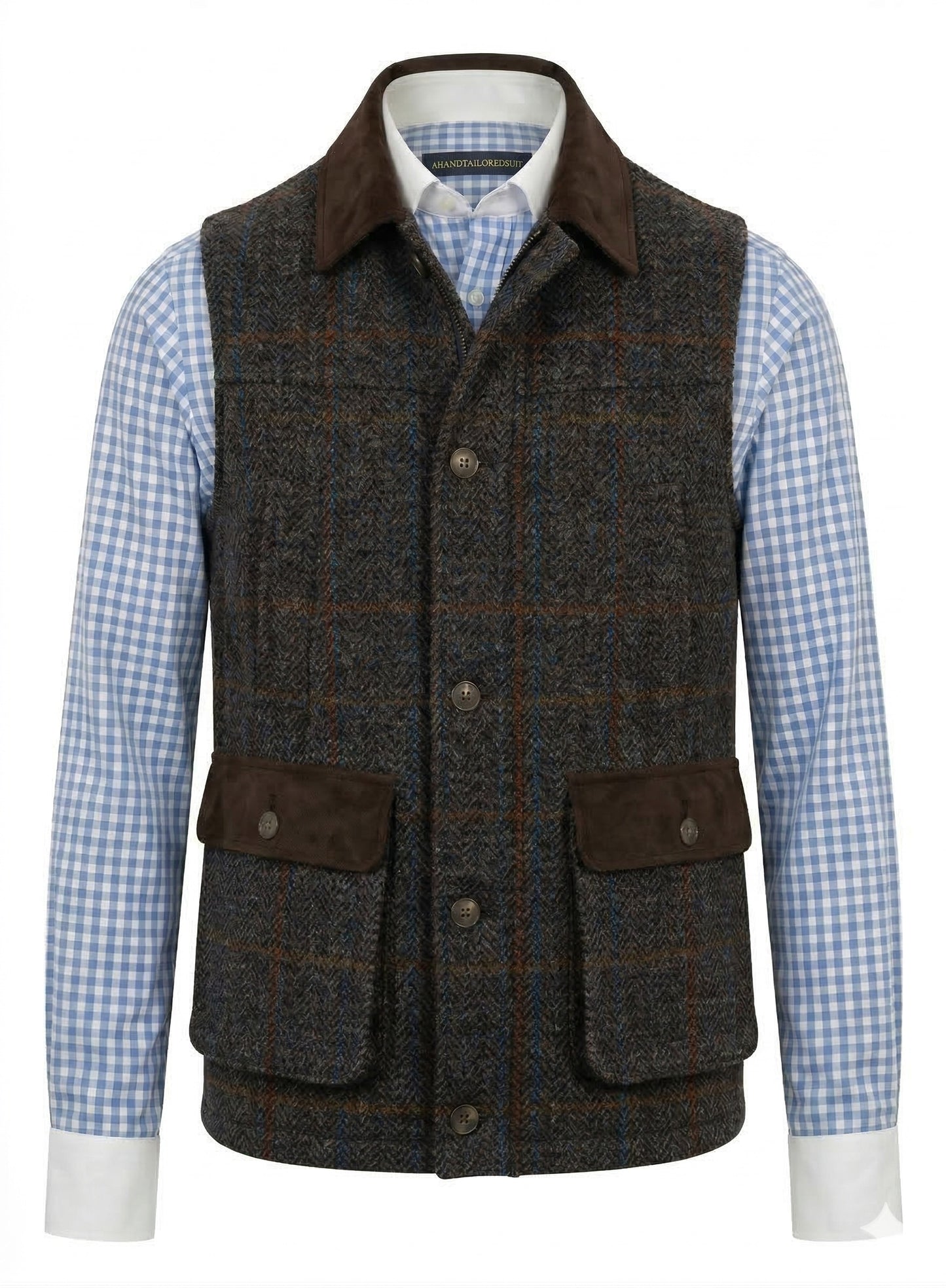 Tweed fabric in a grey & brown herringbone with a rusty orange and blue overcheck.