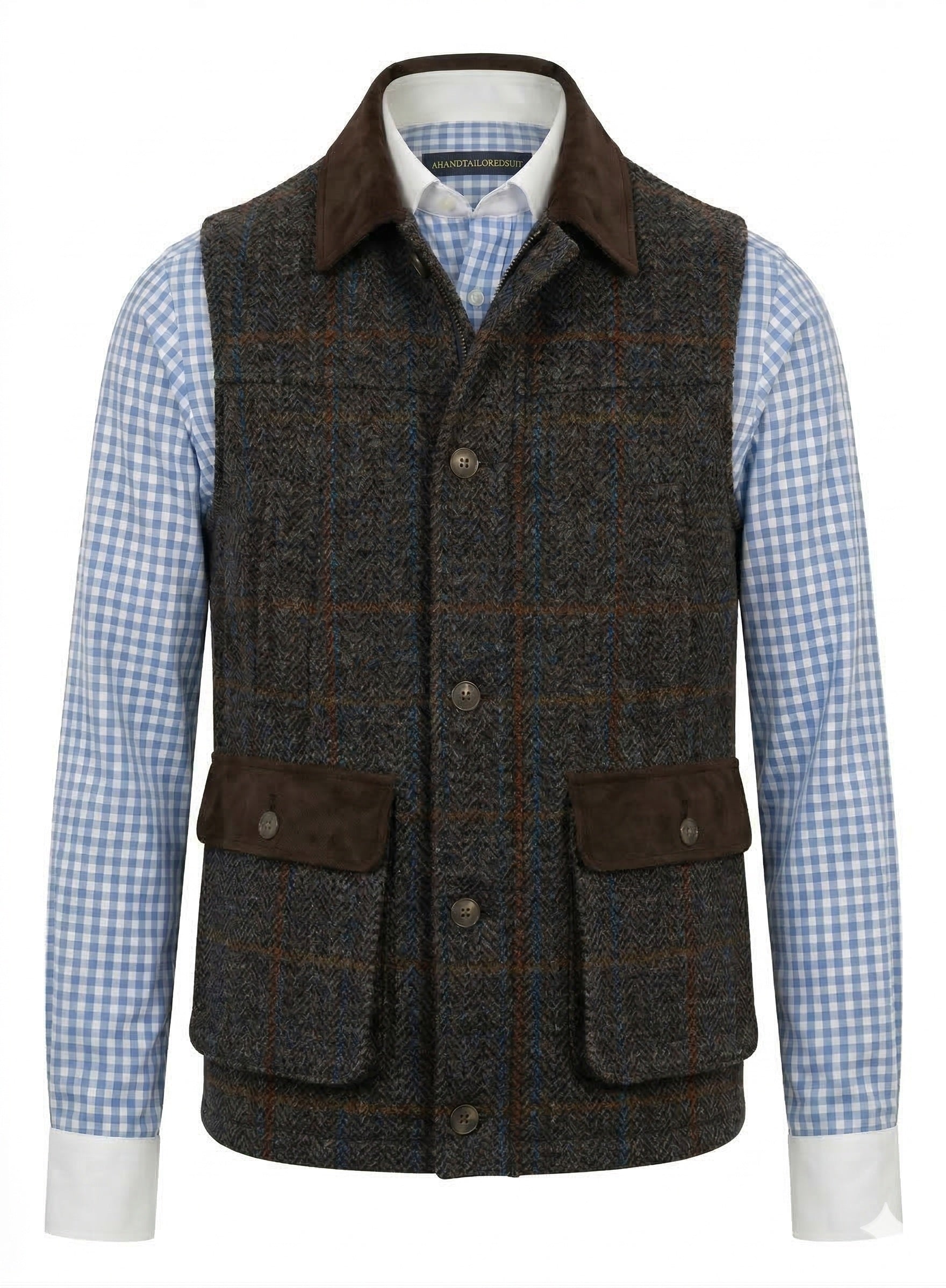 Tweed fabric in a grey & brown herringbone with a rusty orange and blue overcheck.