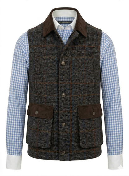 Tweed fabric in a grey & brown herringbone with a rusty orange and blue overcheck.