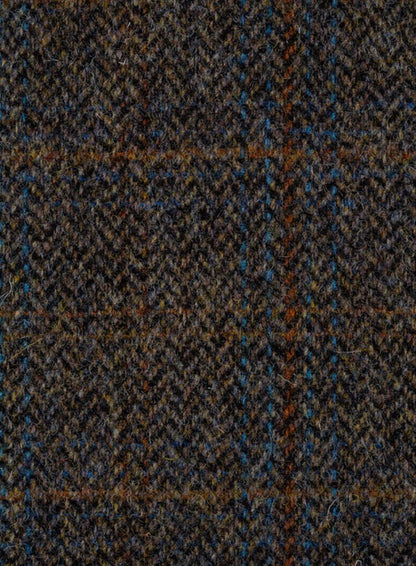 Tweed fabric in a grey & brown herringbone with a rusty orange and blue overcheck.
