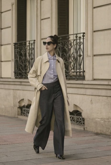 Women walking in beige raincoat 